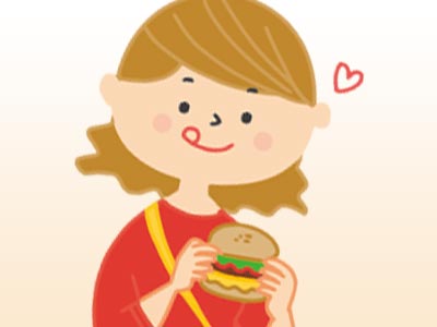 ハンバーガーを食べる女性